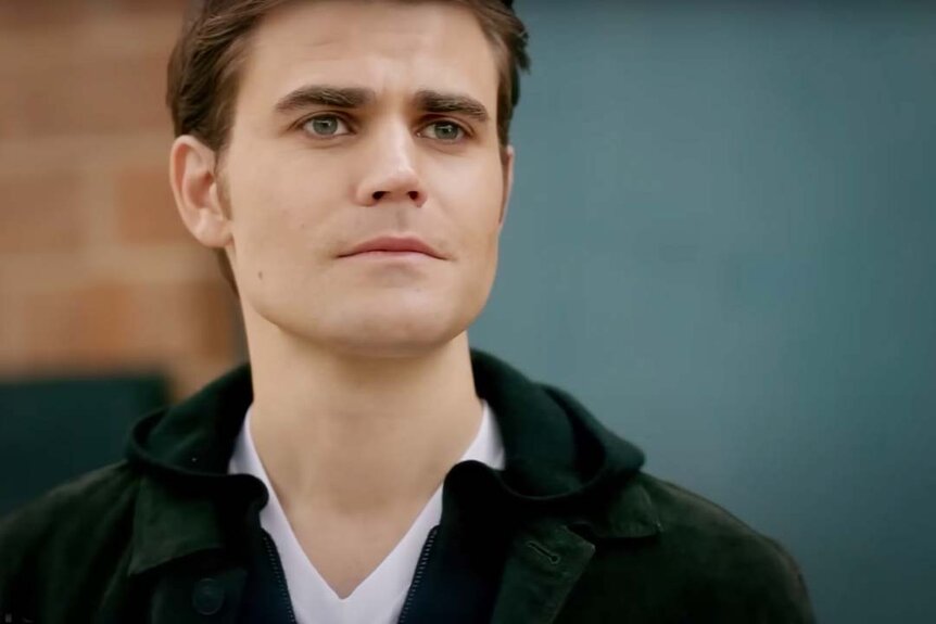 Stefan Salvatore (Paul Wesley) appears in a white shirt and black jacket in The Vampire Diaries.