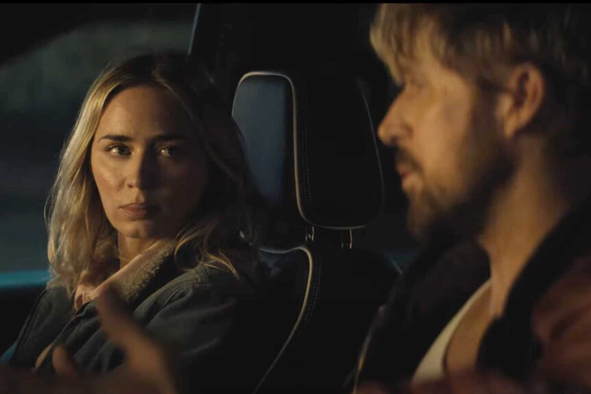Emily Blunt and Ryan Gosling sit in a car in The Fall Guy Trailer