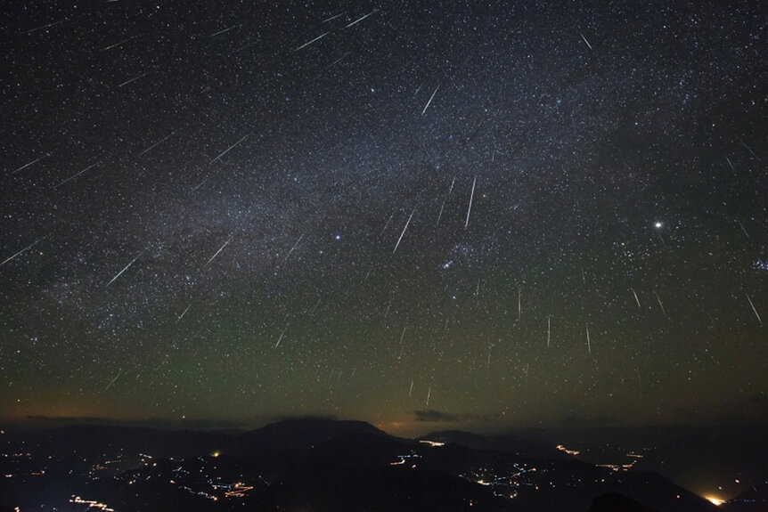 The Geminids meteor shower at night