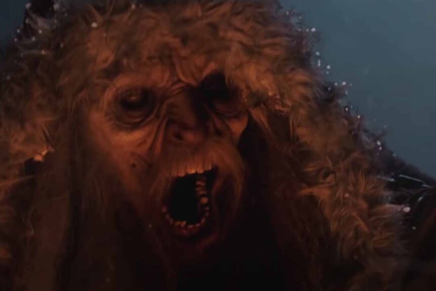 Krampus (Gideon Emery) appears as a wrinkly old monster roaring in Krampus (2015)