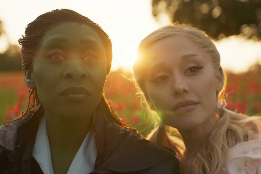 A scene from Wicked featuring Ariana Grande and Cynthia Erivo
