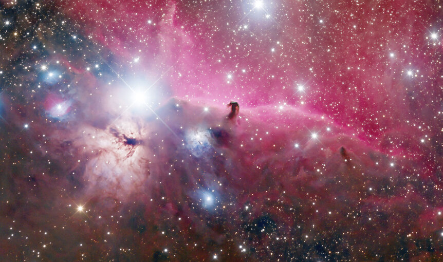 The Horsehead (center) and Flame (left) nebulae, located on Orion’s belt. Credit: Adam Block/Steward Observatory/University of Arizona