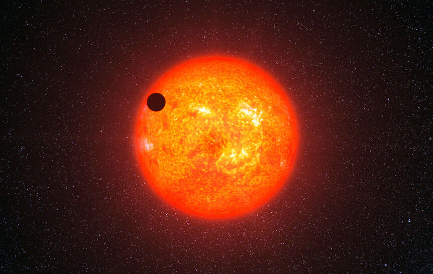 Artwork depicting a planet in transit across a star. Credit: ESO/L. Calçada