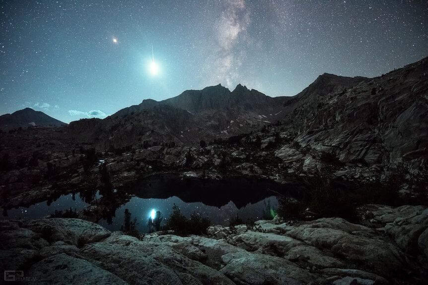 A possible Alpha Capricornid fireball lights up the sky over the Sierra Nevada mountains in this photo taken by Brad Goldpaint. Credit: Brad Goldpaint