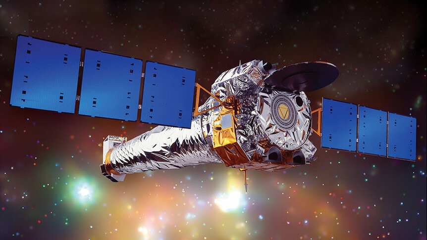 Artwork of the Chandra X-Ray Observatory in space. Credit: NASA/CXC/NGST