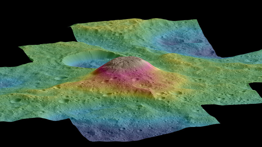 Elevation map of Ahuna Mons on Ceres, with colors representing different heights above the average. Ahuna Mons is 4 km high. Credit: NASA/JPL-Caltech/UCLA/MPS/DLR/IDA