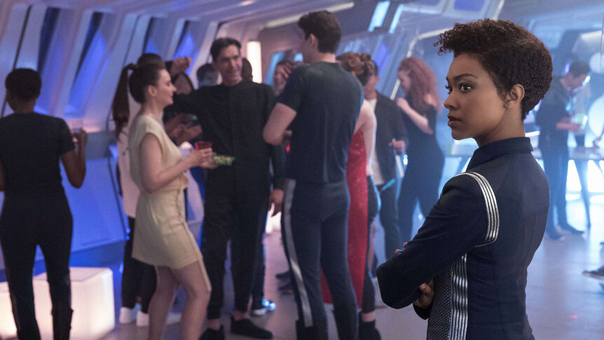 Michael Burnham attends a party on Discovery