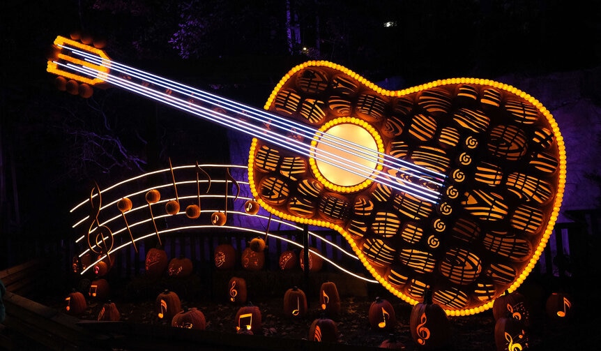 light-up guitar at nighttime