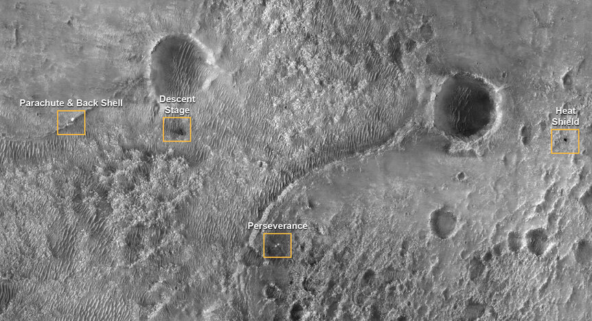 The Mars Reconnaissance Orbiter HiRISE camera saw the Perseverance hardware (parachute and backshell, heat shield, descent stage, and the rover itself) on the surface of Mars after the landing on February 18, 2021. Credit: NASA/JPL-Caltech/University of A