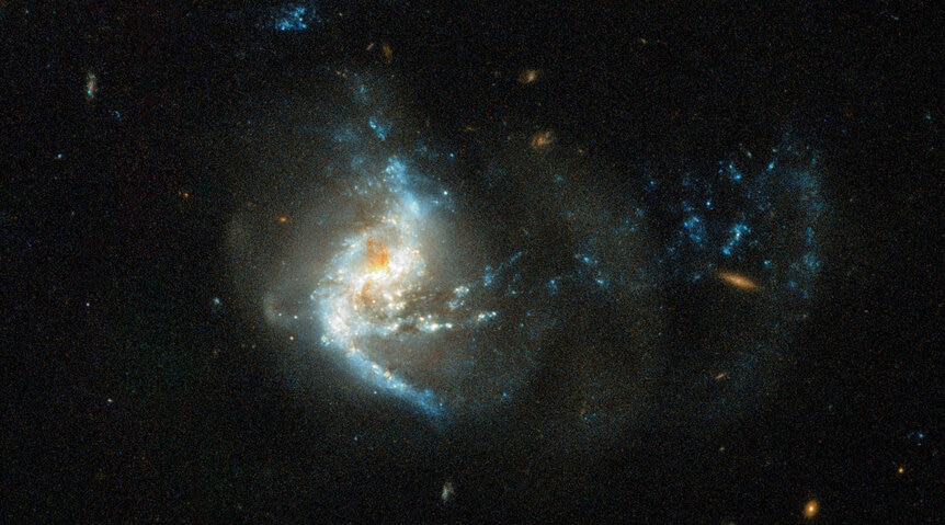 Arp 256S in detail, which looks more disturbed than its partner. Credit: ESA/Hubble, NASA