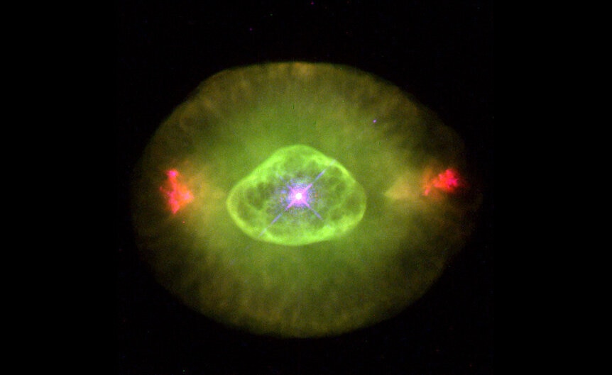 NGC 6826 is a planetary nebula, a dying star whose light is causing previously expelled gas around it to glow.