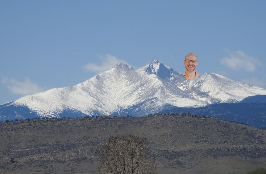 Panhuman Phil peeks over the peaks. Credit: Phil Plait
