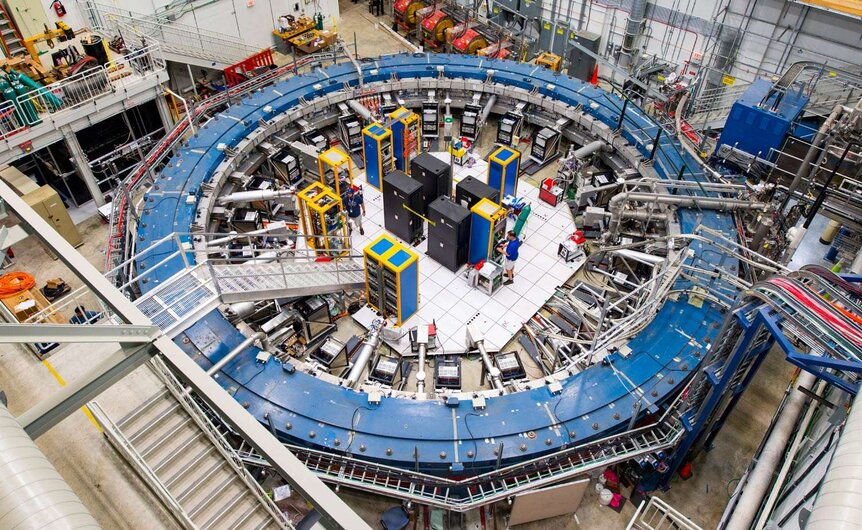 The ring magnet at the heart of the Muon g-2 experiment at Fermilab provides a stable magnetic field in which muons spin. Credit: Fermilab / Reidar Hahn
