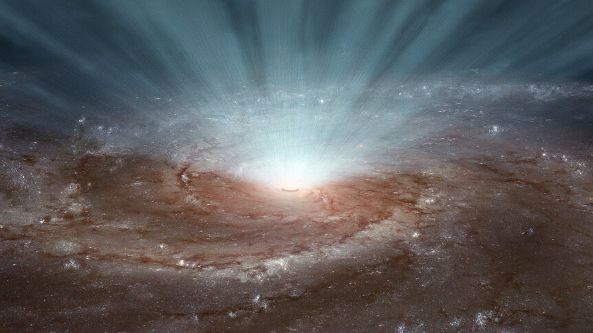 Artwork depicting a wind blowing from a supermassive black hole in the center of a galaxy. Credit: NASA/JPL-Caltech