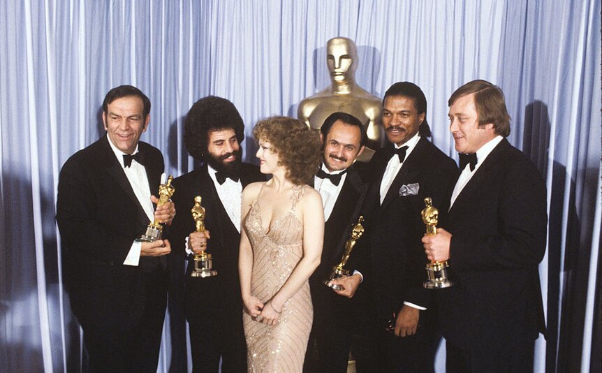 Bernadette Peters and Billy Dee Williams with Best Sound winners Bill Varney, Steve Maslow, Gregg Landaker, and Peter Sutton