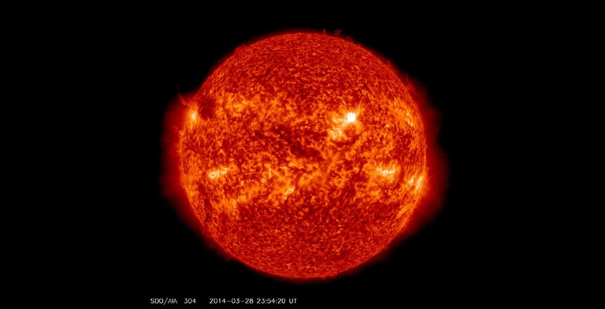 On March 28, 2014, a sunspot associated with active region 12017 on the Sun flared (bright spot to the upper right), one of many times it flared that week. It was this active region that was modeled using a supercomputer. Credit: NASA/SDO