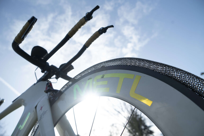 Sunlight passes through alloy mesh of the SMART METL bicycle tire