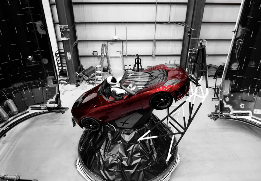 Shortly before launch, the Tesla Roadster complete with spacesuit-clad dummy are mounted into the Falcon Heavy payload assembly. Credit Elon Musk/Instagram