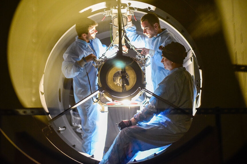 Engineers install the 65 megapixel Zwicky Transient Factory camera into the 1.3 meter Samuel Oschin Telescope at Palomar Observatory. Credit: Caltech Optical Facility