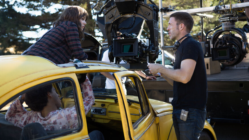 Jorge Lendeborg Jr., Hailee Steinfeld and Director Travis Knight on the set of Bumblebee