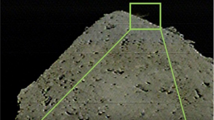JAXA's Hayabusa2 spacecraft bombing a crater into the asteroid Ryugu
