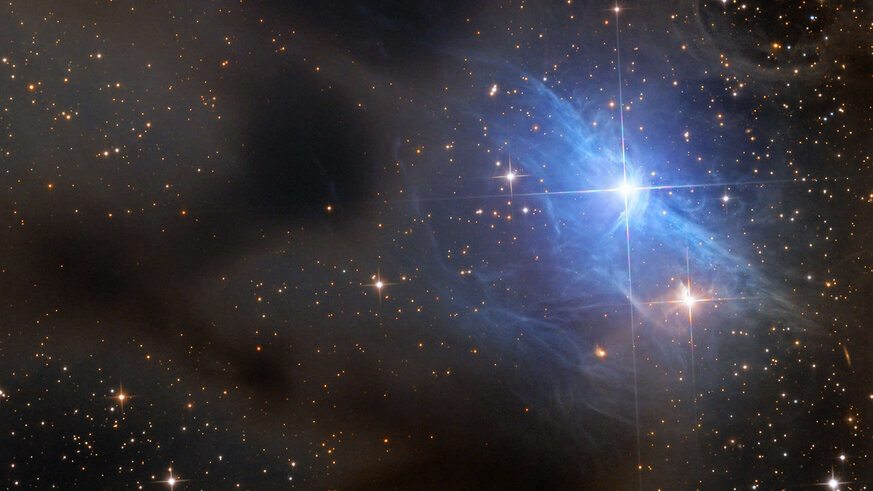 The dark dust clouds of vdB31, illuminated by and reflecting the light of the bright blue star AB Aurigae. Credit: Adam Block/Mount Lemmon SkyCenter/University of Arizona