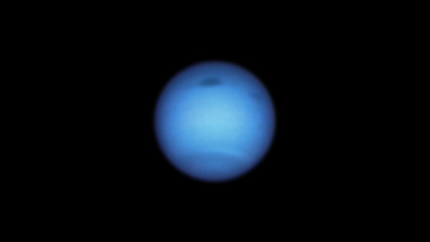 A Hubble image taken in January 2020 shows a large dark spot on Neptune and a smaller one that may have spun off of it. Credit: NASA / ESA / STScI / M.H. Wong (University of California, Berkeley) and L.A. Sromovsky and P.M. Fry (University of Wisconsin-Ma