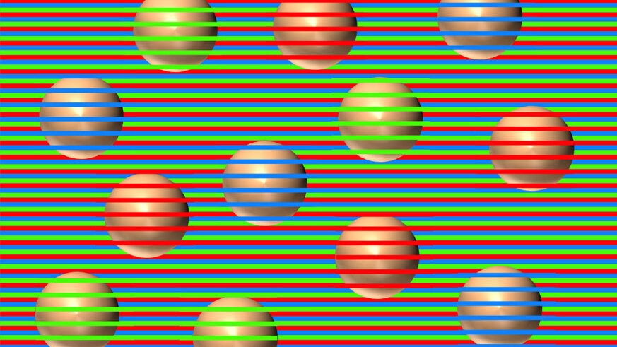 A color contrast optical illusion makes it look like the balls are different colors. In reality they are all the same color and shading. Credit: David Novick, used with permission