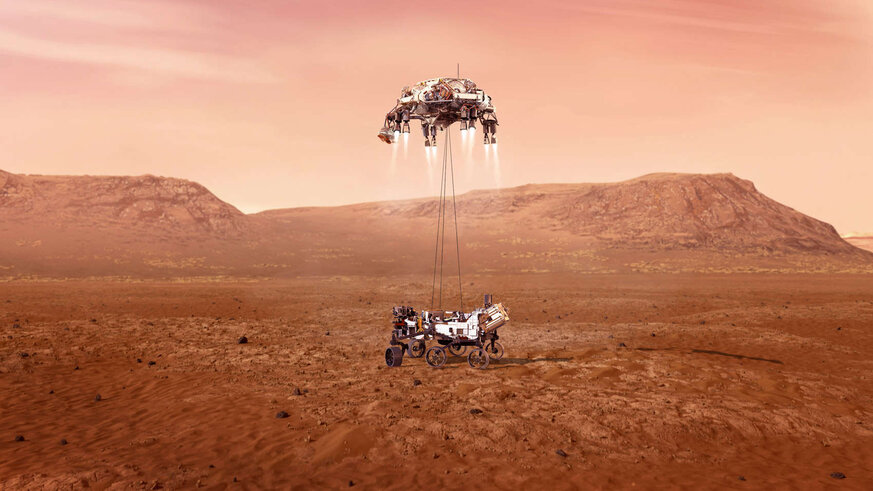 Artwork showing the Perseverance rover suspended by cables under the rocket-powered sky crane just as it lands on Mars. Credit: NASA/JPL-Caltech
