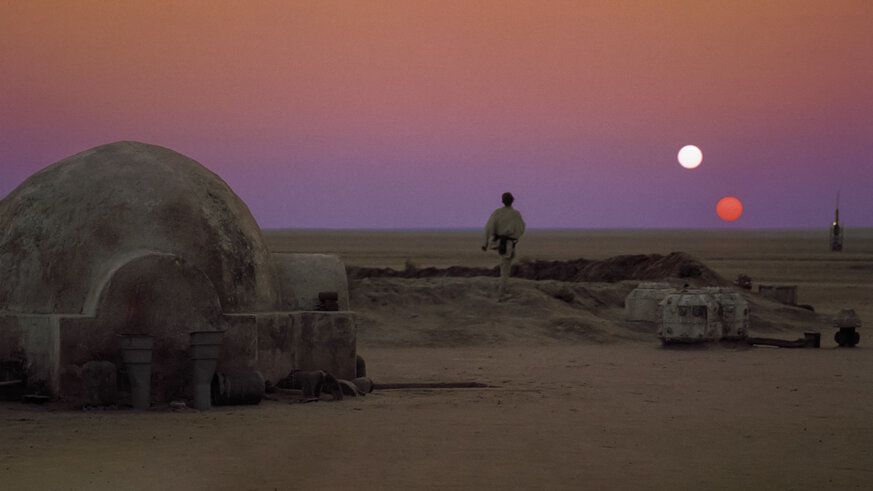A binary sunset on Tatooine. There’s a lot of science hiding in this shot. Credit: Disney/Lucasfilm