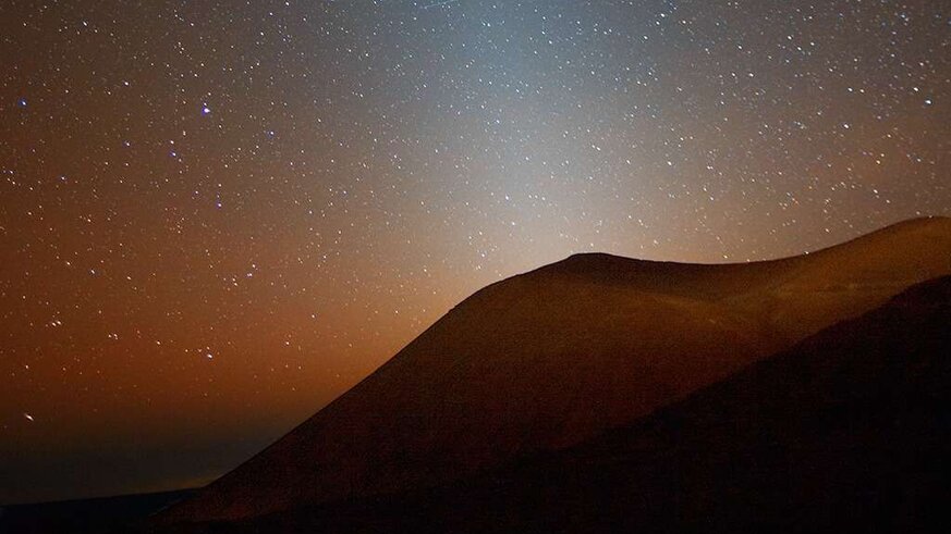 Zodiacal light, sunlight reflected off of tiny dust particles that orbit the Sun between Earth and the asteroid belt. Credit: Rogelio Bernal Andreo