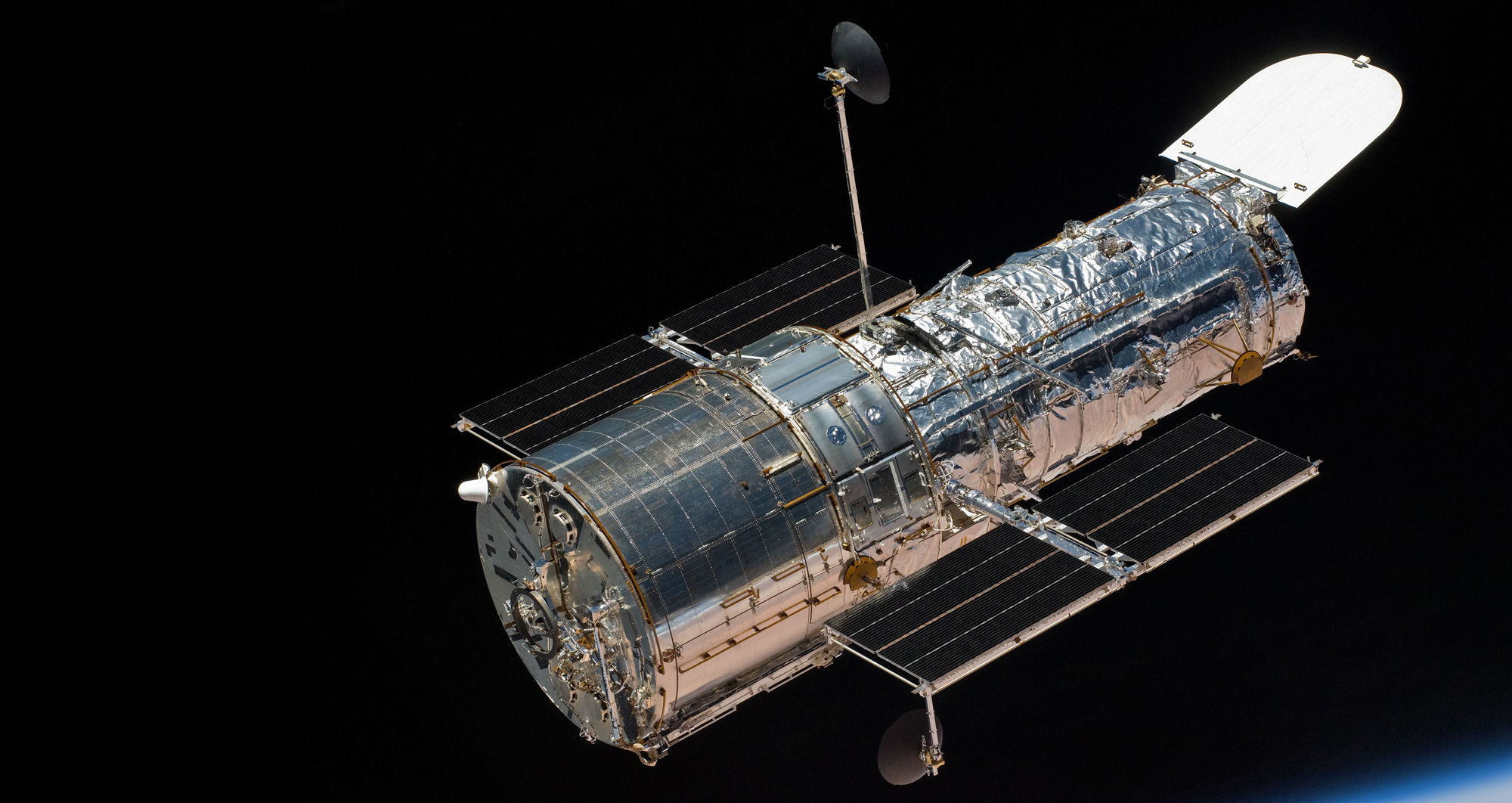 The NASA/ESA Hubble Space Telescope, seen here above the Earth during the last servicing mission in 2009. Credit: NASA