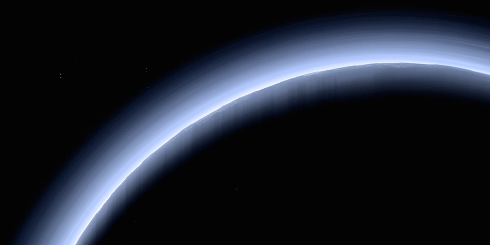 Pluto backlit by the Sun