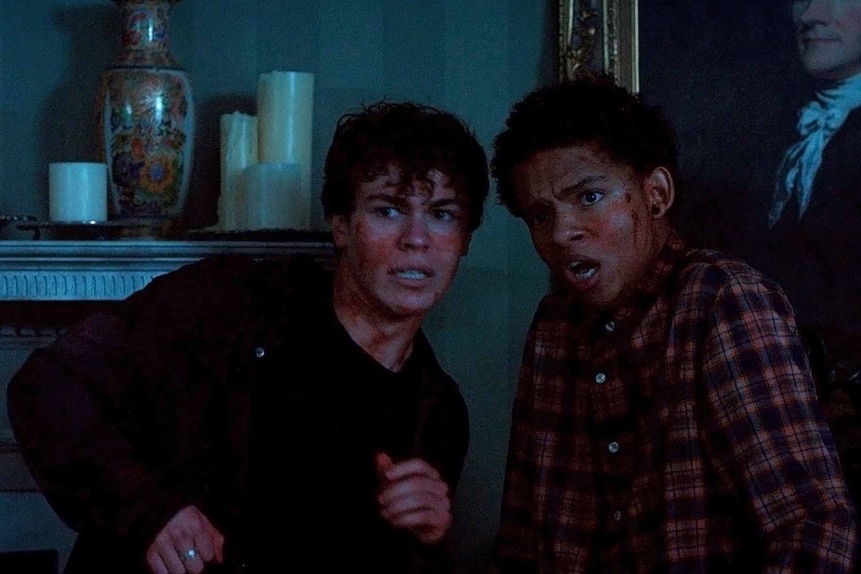 Jake Wheeler and Devon Evans are covered in blood in Chucky Episode 307.