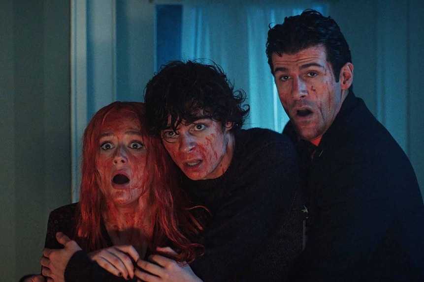 Lexy Cross, Grant Collin, and Hicks are covered in blood in Chucky Episode 307.