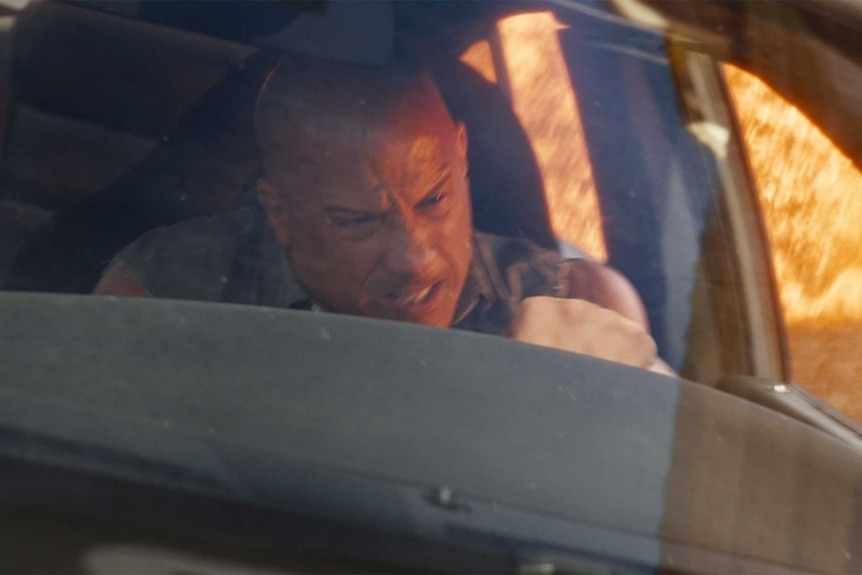 Vin Diesel as Dom in Fast X driving a car